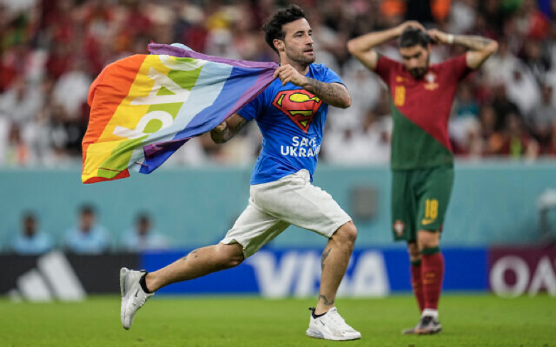 Man Invades World Cup Game Between Portugal And Uruguay, Carrying A Rainbow Flag