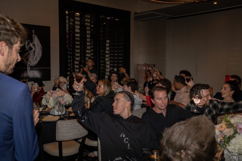 Guests such as Unruly Agency owner, Nicky Gathrite, Game Over Talent Founder, Anthony Pisano, and Enclave & Key CEO, Blake Wynn raise a glass in honor of cover star, Carrington Durham. 