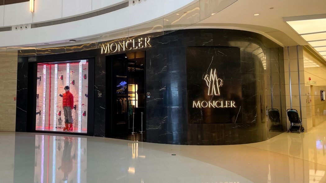 Moncler store at MixC Zhengzhou with mannequin in red jacket
