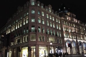 Historic buildings and shops in Mayfair, London at night