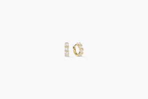 Mejuri Salmon Gold collection earrings with Montana sapphires