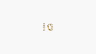 Mejuri Salmon Gold collection earrings with Montana sapphires