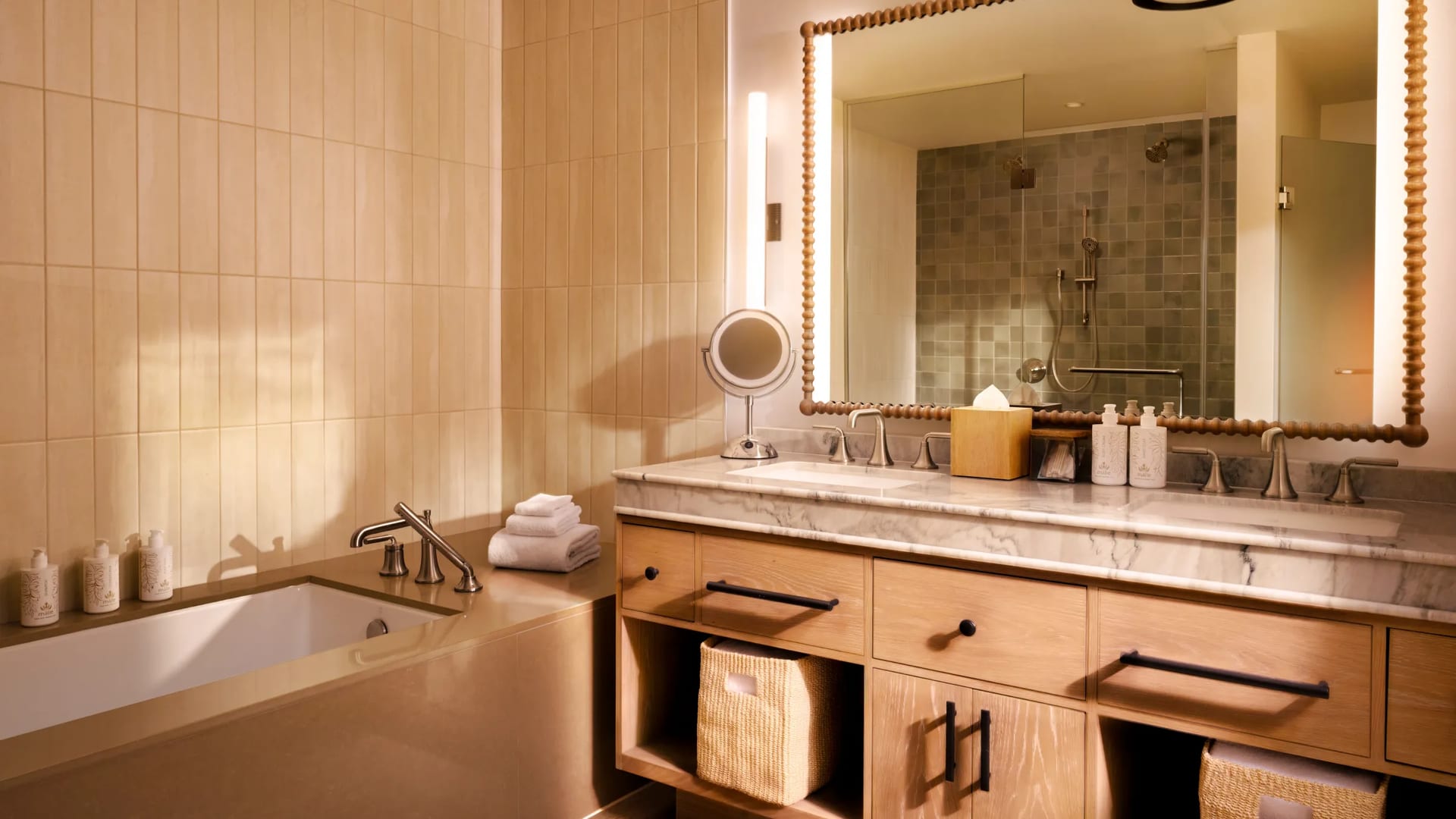Modern bathroom at Hale Hōkūala Kauaʻi with wooden vanity and marble countertop