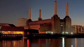 Battersea Power Station at night in Nine Elms, London, seen from across the Thames