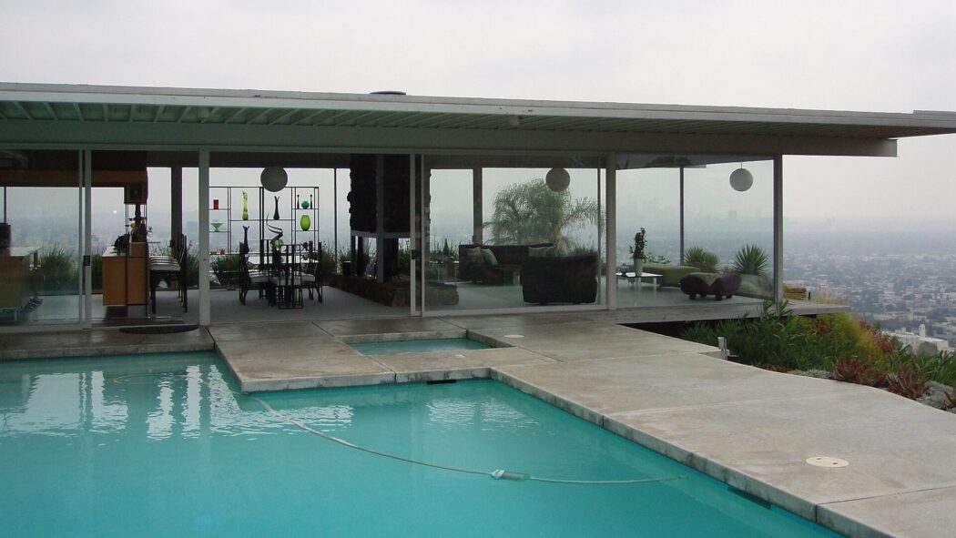 Stahl House with pool, glass walls, and panoramic view over Los Angeles
