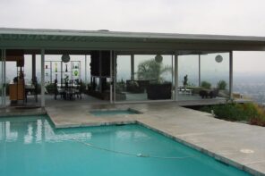 Stahl House with pool, glass walls, and panoramic view over Los Angeles